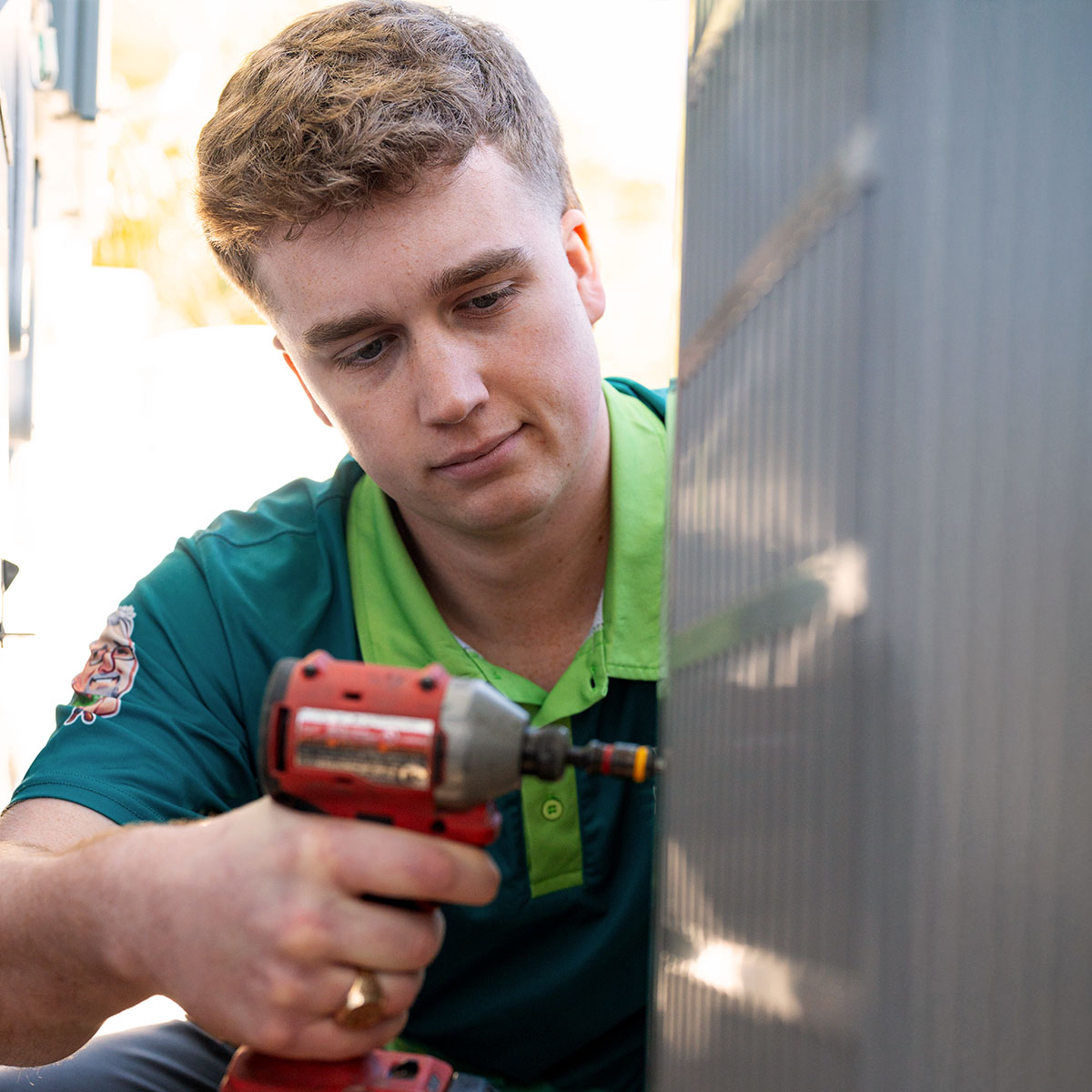 Blanton's technician repairing HVAC unit